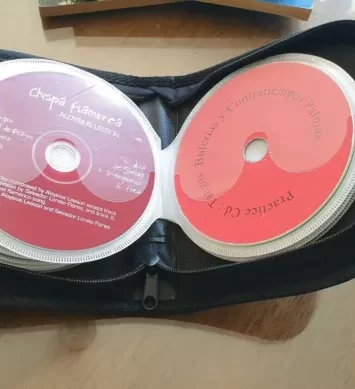 CD zip case with 20 Audio CDs (appear to be flamenco, latino folk etc)