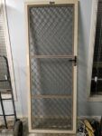 Barrier security screen door