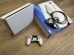 PS4 Console, 3 Controllers & 20 Games