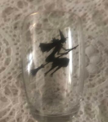“Witch on a broomstick” glass